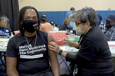 person getting vaccine